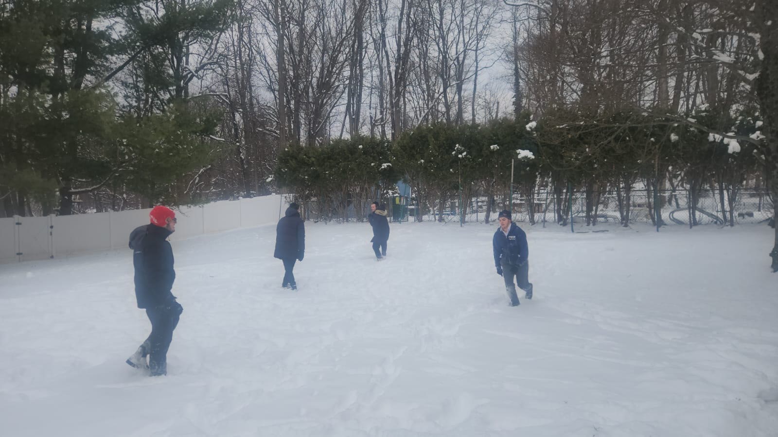Talmidim outside in the snow on the yeshiva grounds