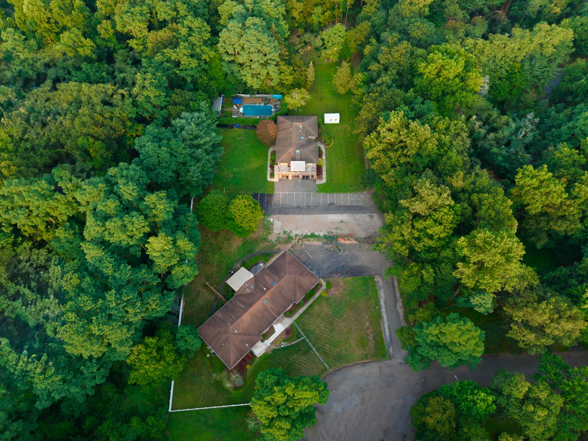Aerial photograph of the wooded Toras Dovid campus in Monsey, New York